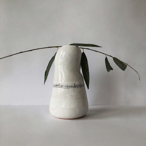 Vase for flowers with female silhouette