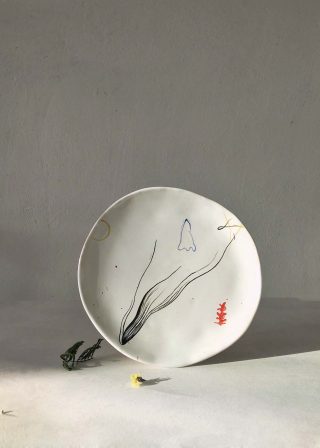 Plate handmade with artistic drawing