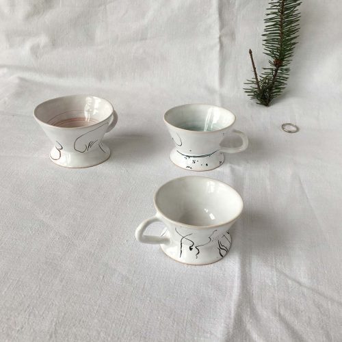Set cups with abstract drawing