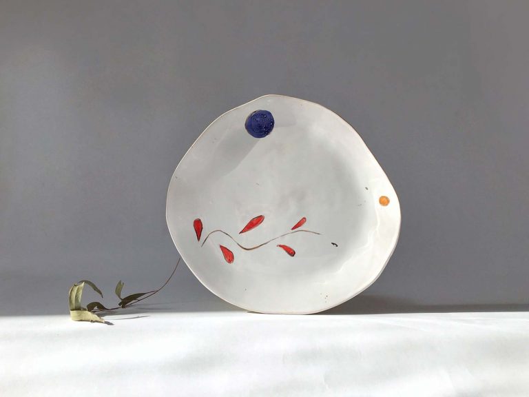 Plate handmade with artistic composition
