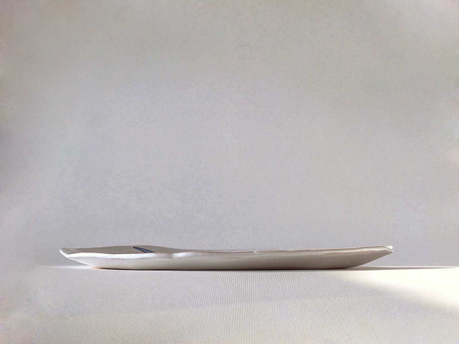 Вид збоку - Велика кругла тарілка